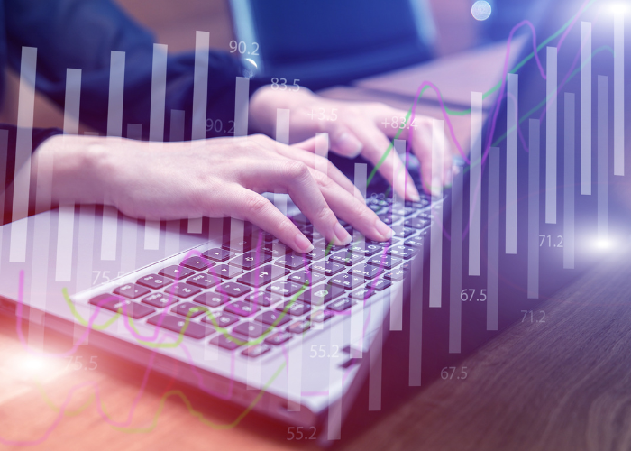 Woman on Laptop Doing Typing, While the rays show different industries