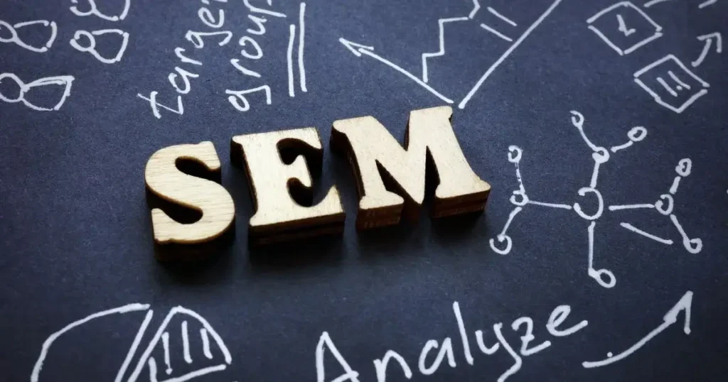 SMM ( Search Engine Marketing ) written while different metrics are labelled around it